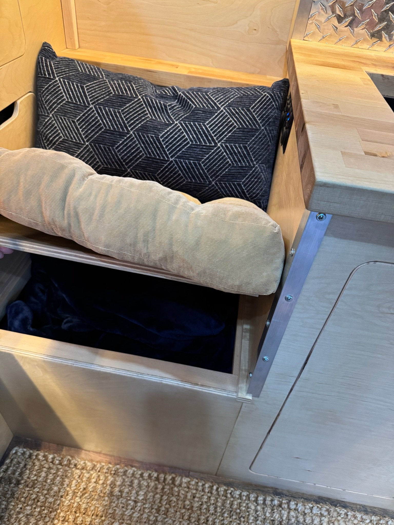 Built-in seating and storage inside the ambulance conversion