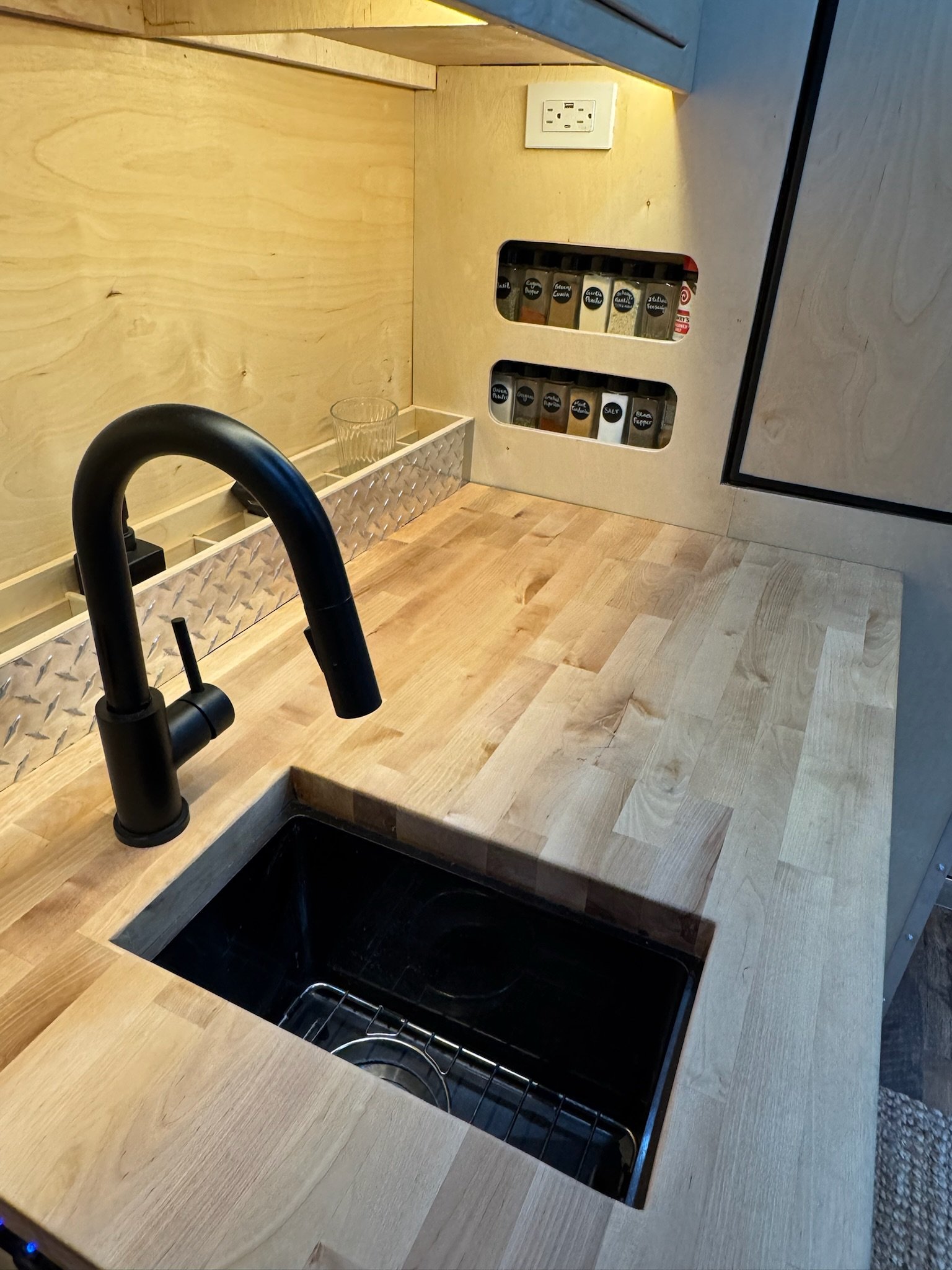 Kitchen sink area inside the ambulance camper conversion