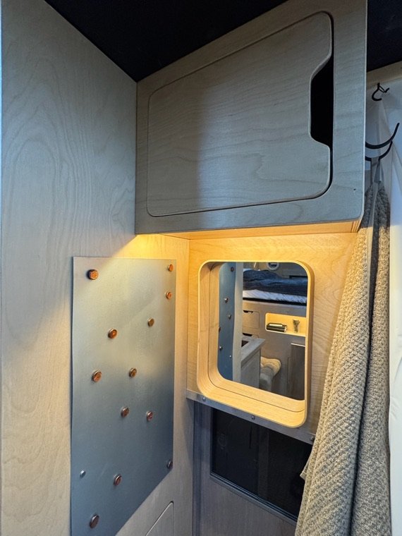 Lit cabinet and vanity mirror